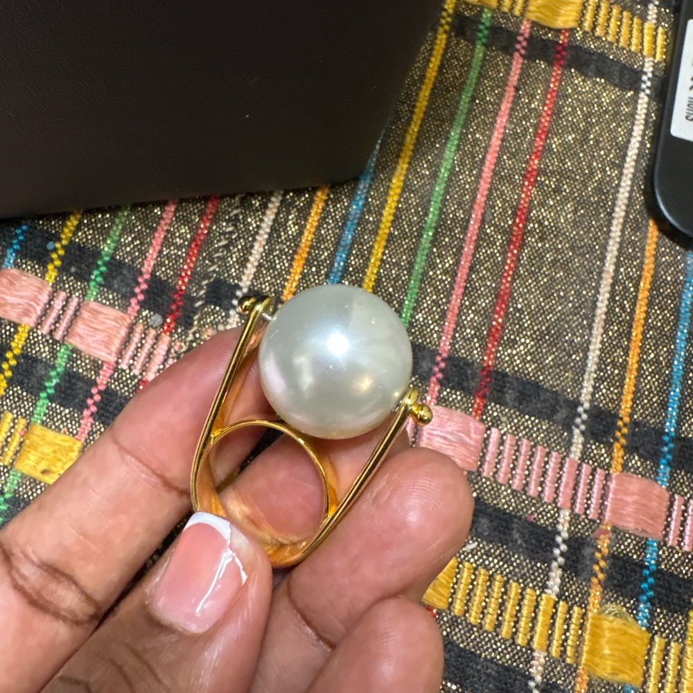 nOir jewelry gold plated pearl spinner ring. Size 8